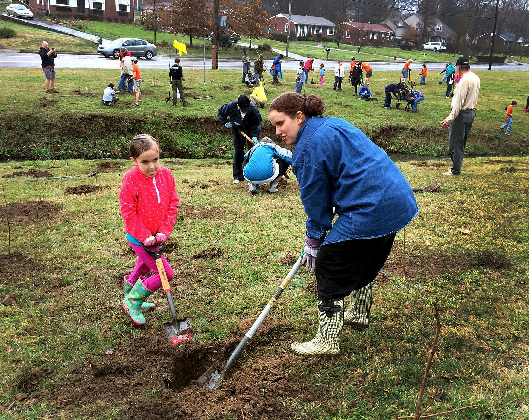 Cadence Cobb (left) and her mother, Megan Cobb, dig at Hillcrest United Methodist Church, Nashville, Tenn. Photo by Kathryn Spry