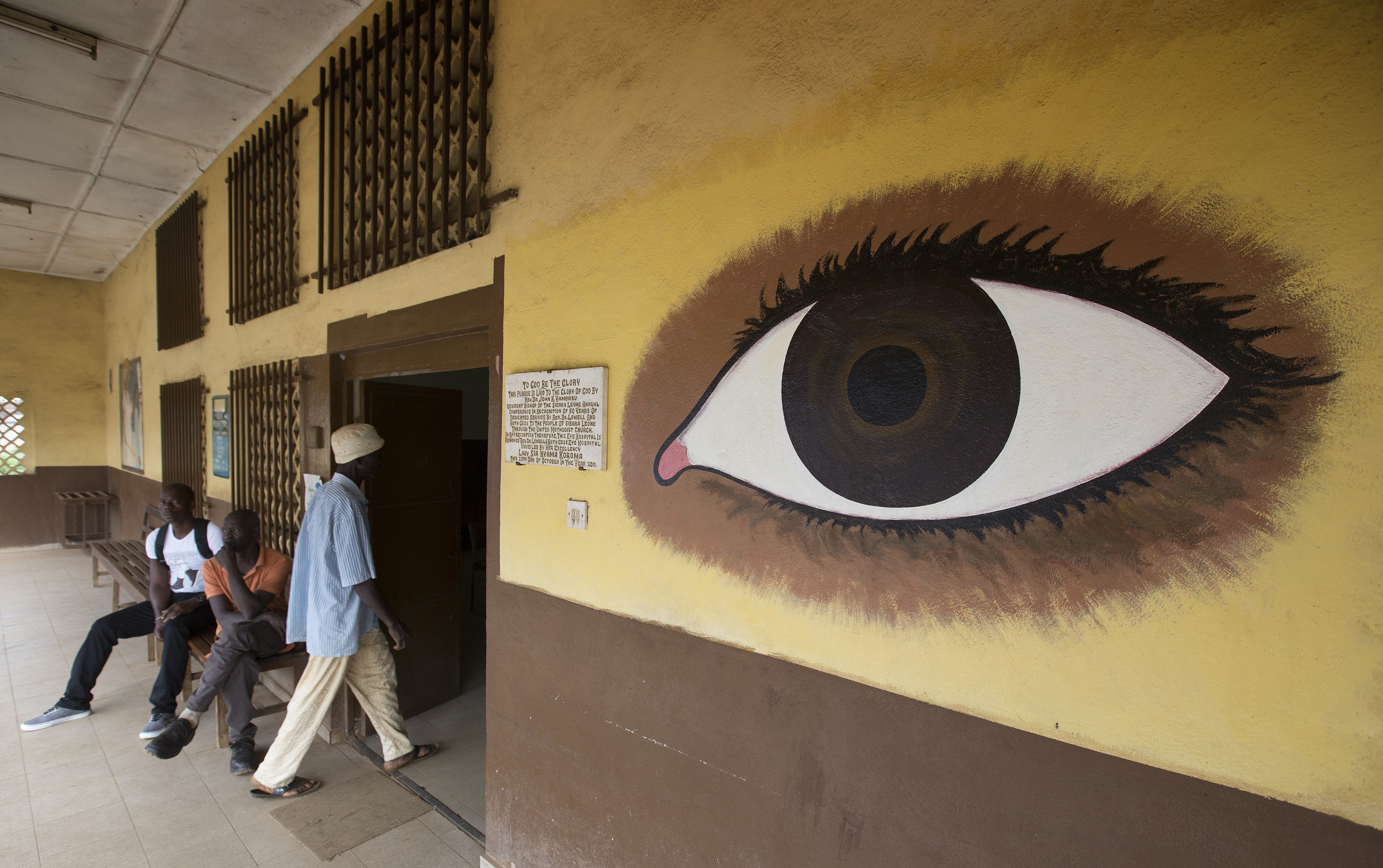 A patient enters the eye clinic at the United Methodist Church's Kissy Hospital in Freetown, Sierra Leone. 