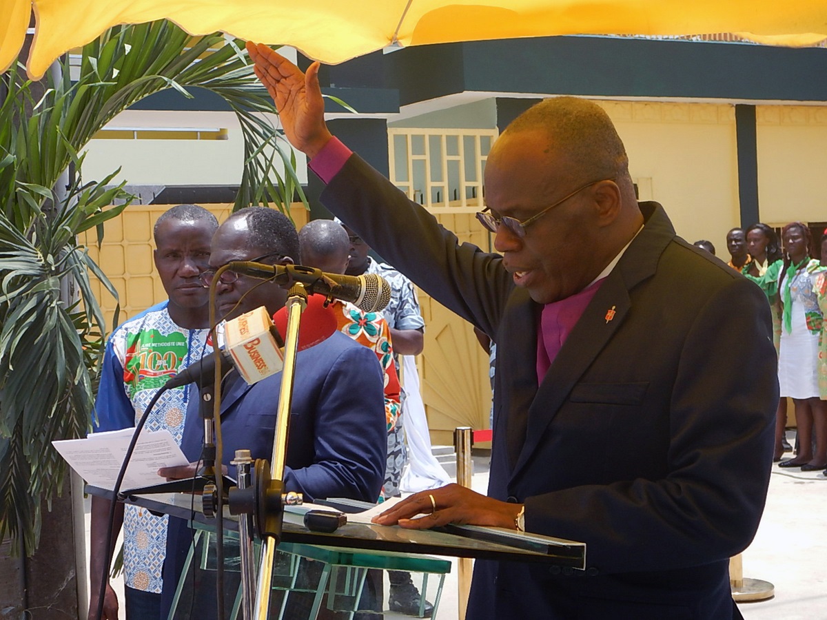 Bishop Benjamin Boni blesses the Côte d'Ivoire United Methodist Church missionary guest house. Photo by Isaac Broune, UMNS