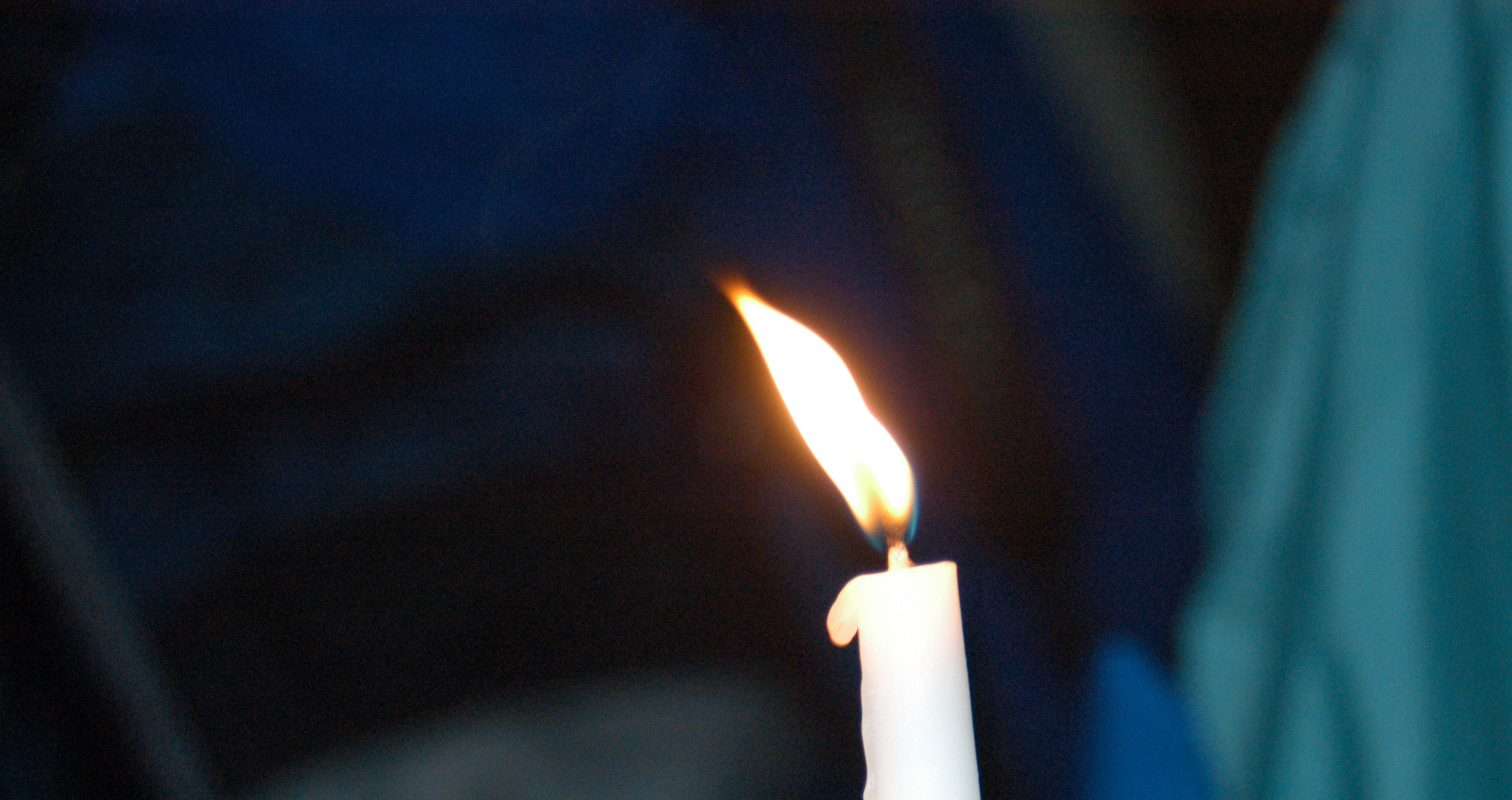 Image of single candle. Photo by Mike DuBose, UMNS.