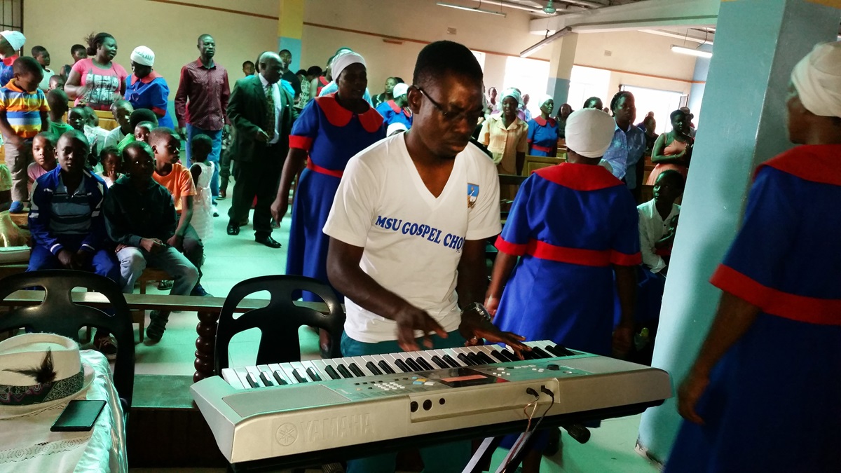 One of the key people in promoting upbeat music at the St. Peter’s is music director Edmore Simbarashe Magureyi. Magureyi plays a variety of musical instruments, including the piano. Photo by Eveline Chikwanah, UMNS