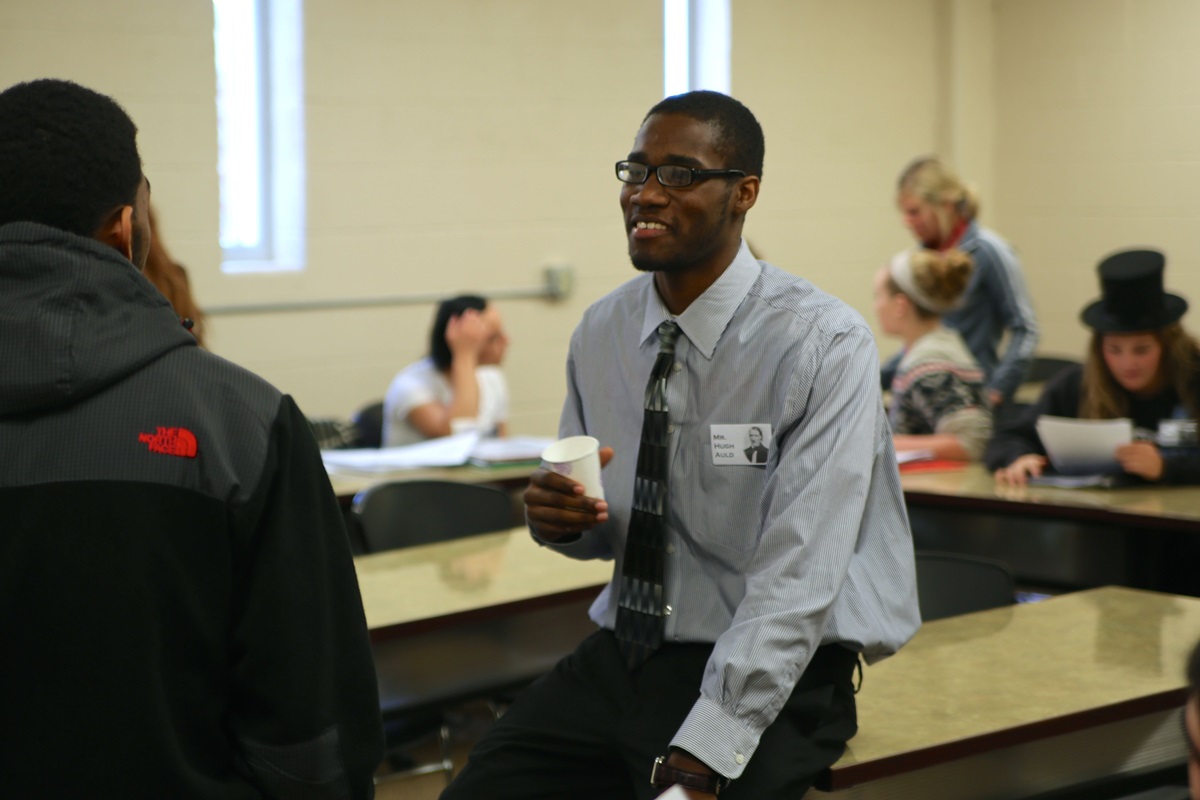 Adrian College student Gregory Roy prepares to enter the debate in the game used to teach students about history. Photo by Mike Neal