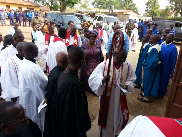 Clergy process into Sierra Leone Annual Conference Sunday service at Rogers Memorial UMC, Bo in southern Sierra Leone. Sierra Leone’s First Lady, Sia Nyama Koroma, follows the bishop.