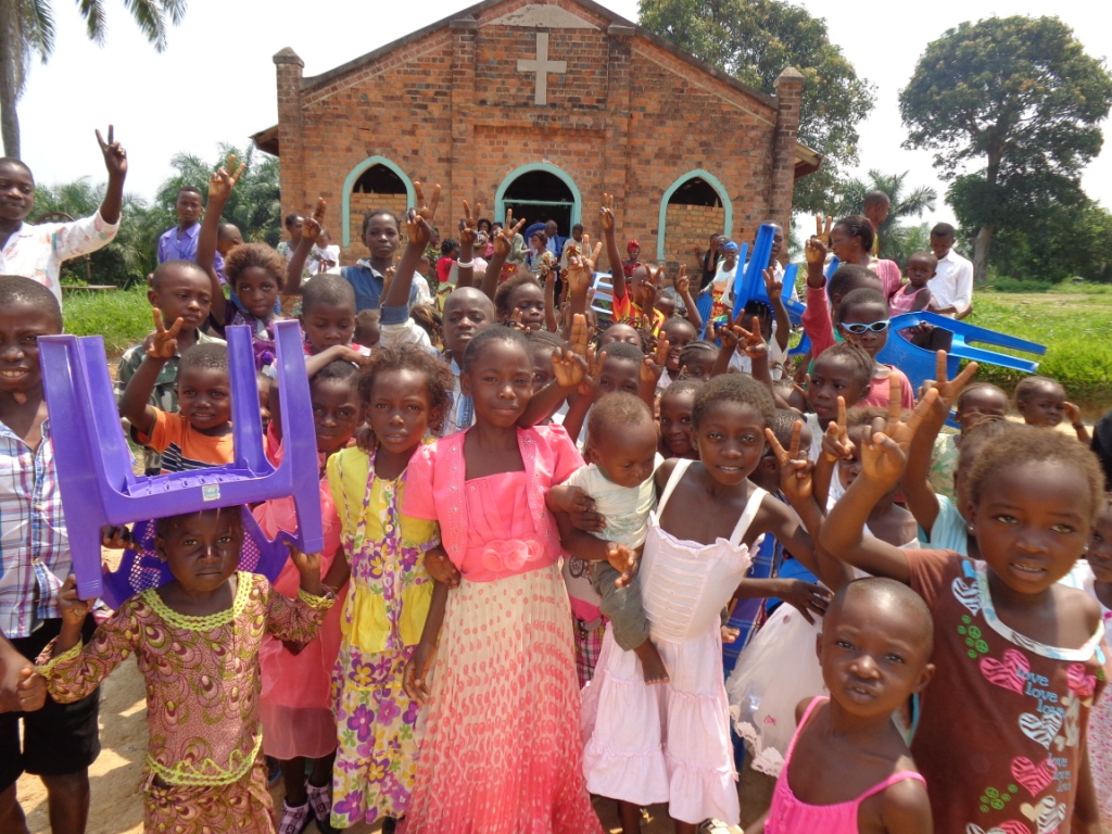 The children of Lokole United Methodist Church in Kindu, Democratic Republic of Congo, after a service. Alfred Zigbuo is visiting churches in the East Congo Episcopal Area to get an idea of what the needs are. Photo courtesy of Alfred Zigbuo