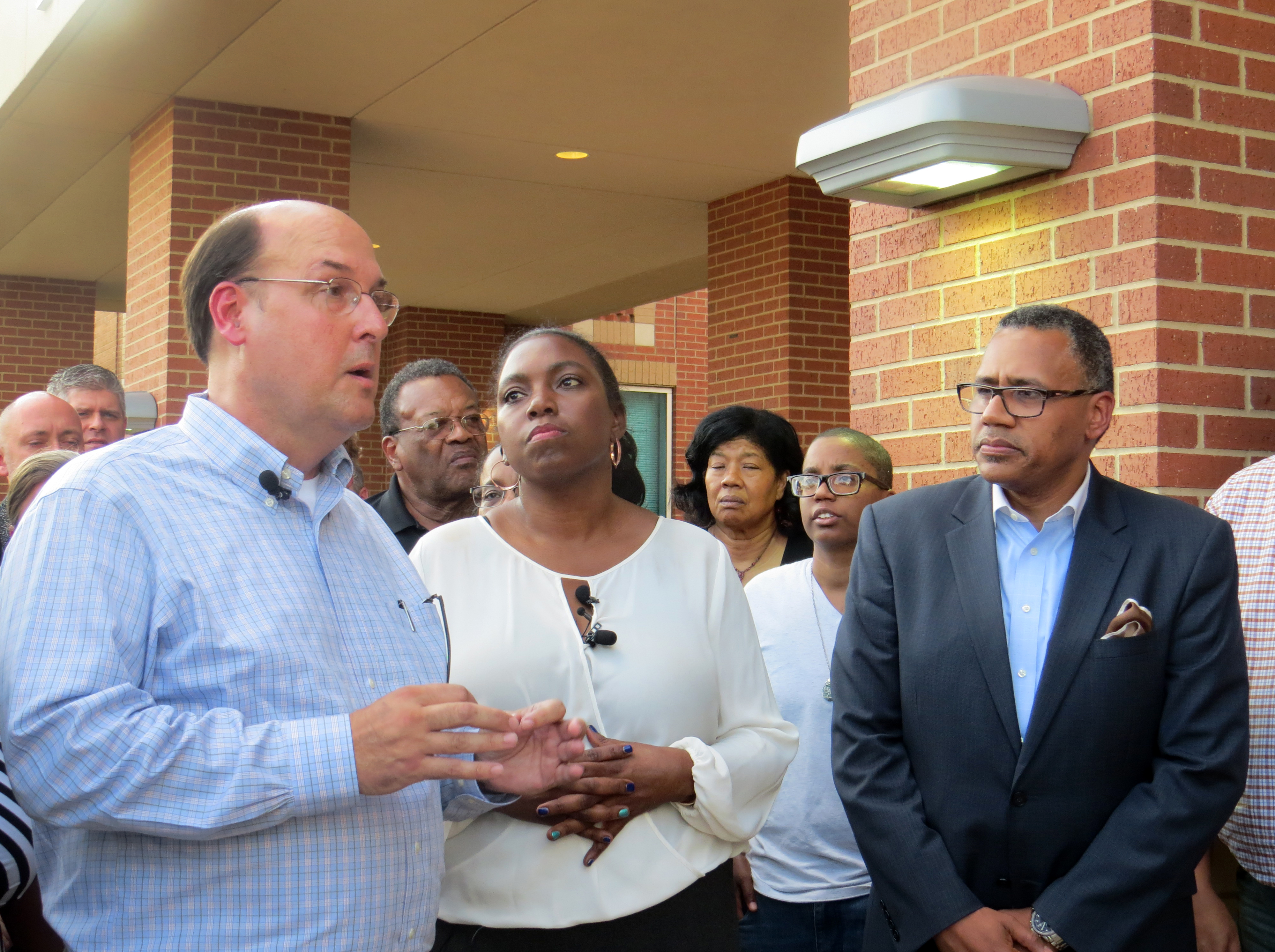 A McKinney, Texas police officer's conduct toward black youth prompted a press conference by United Methodist clergy outside McKinney police headquarters on Tuesday, June 9.  Speaking were the Rev. Thomas Brumett (left), pastor of First United Methodist Church of McKinney, Texas, the Rev. Frances Cudjoe Waters, president of the North Texas Conference African American Clergy Fellowship, and the Rev. Michael Bowie, Jr., pastor of St. Luke Community United Methodist Church in Dallas. Photo by Sam Hodges, UMNS