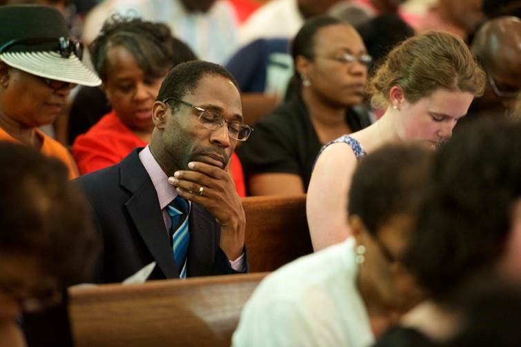 The Rev. Ken Nelson, a United Methodist staff member of the South Carolina Conference, attends a prayer service June 18 at Bethel AME Church in Columbia, S.C. Photo by Matt Brodie, South Carolina Conference