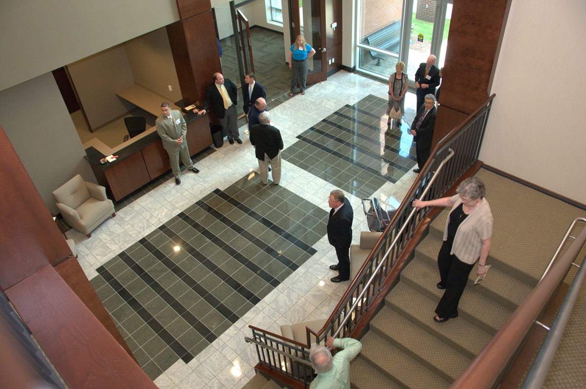 A light-filled lobby is among the highlights of the North Carolina Conference’s LEED-certified headquarters, which opened in 2010. An employee patio overlooks the property’s wooded setting.