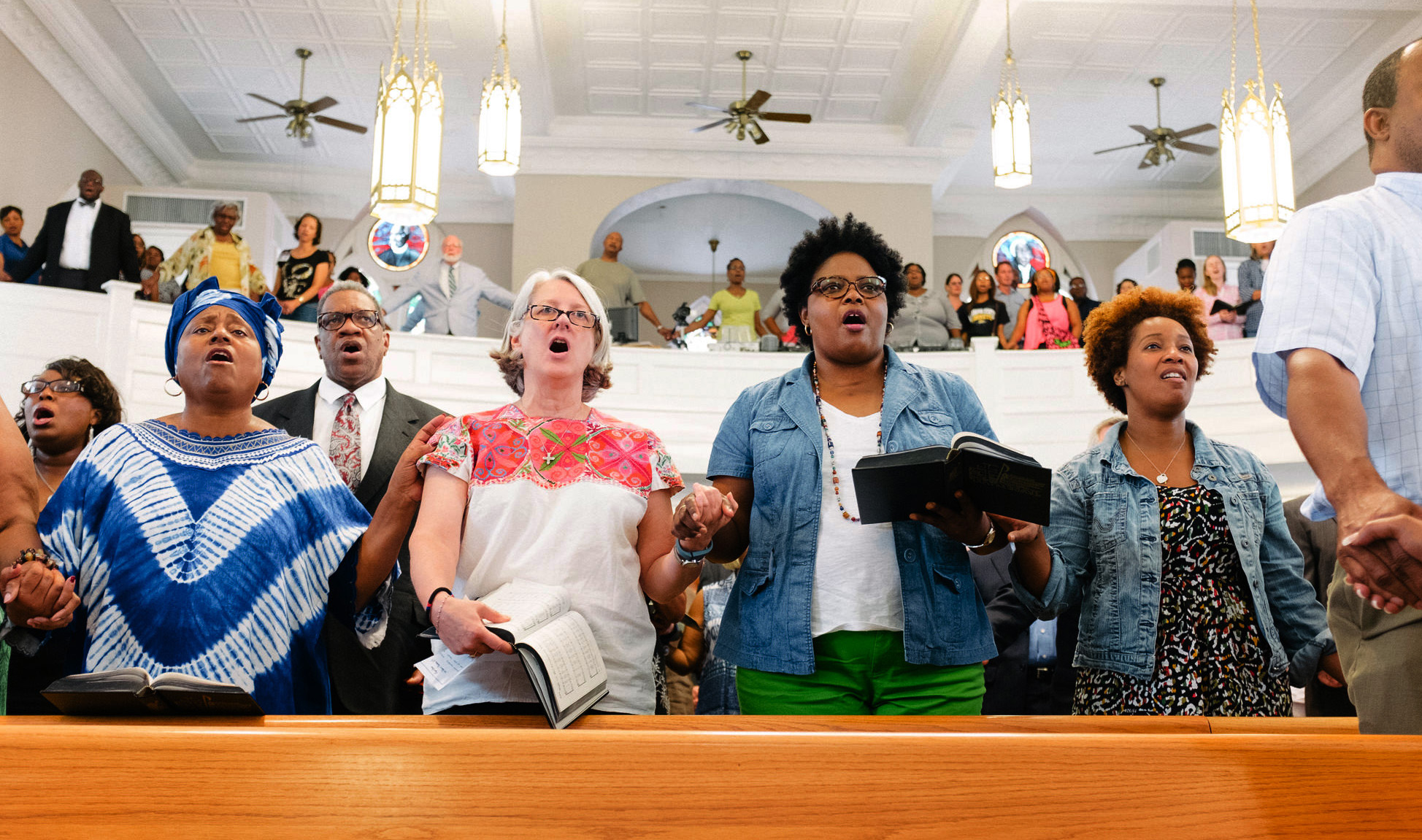 About 150 people, including United Methodists, attended a June 19 ecumenical prayer service at St. John’s African Methodist Episcopal Church in Montgomery, Ala., in response to the church shootings at Emanuel AME Church in Charleston, S.C. Photo by Luke Lucas