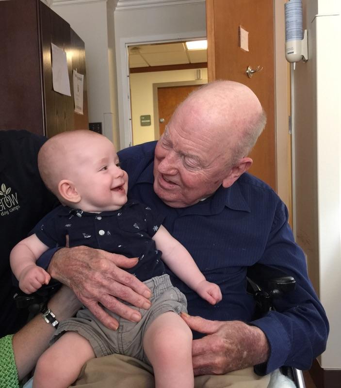 When he was a pastor in the Atlanta area, retired United Methodist Bishop Bevel Jones III would invite preachers from The Protestant Hour to speak at his churches. He’s seen here with great-grandson Eli Jones. Photo courtesy the Rev. David Bevel Jones