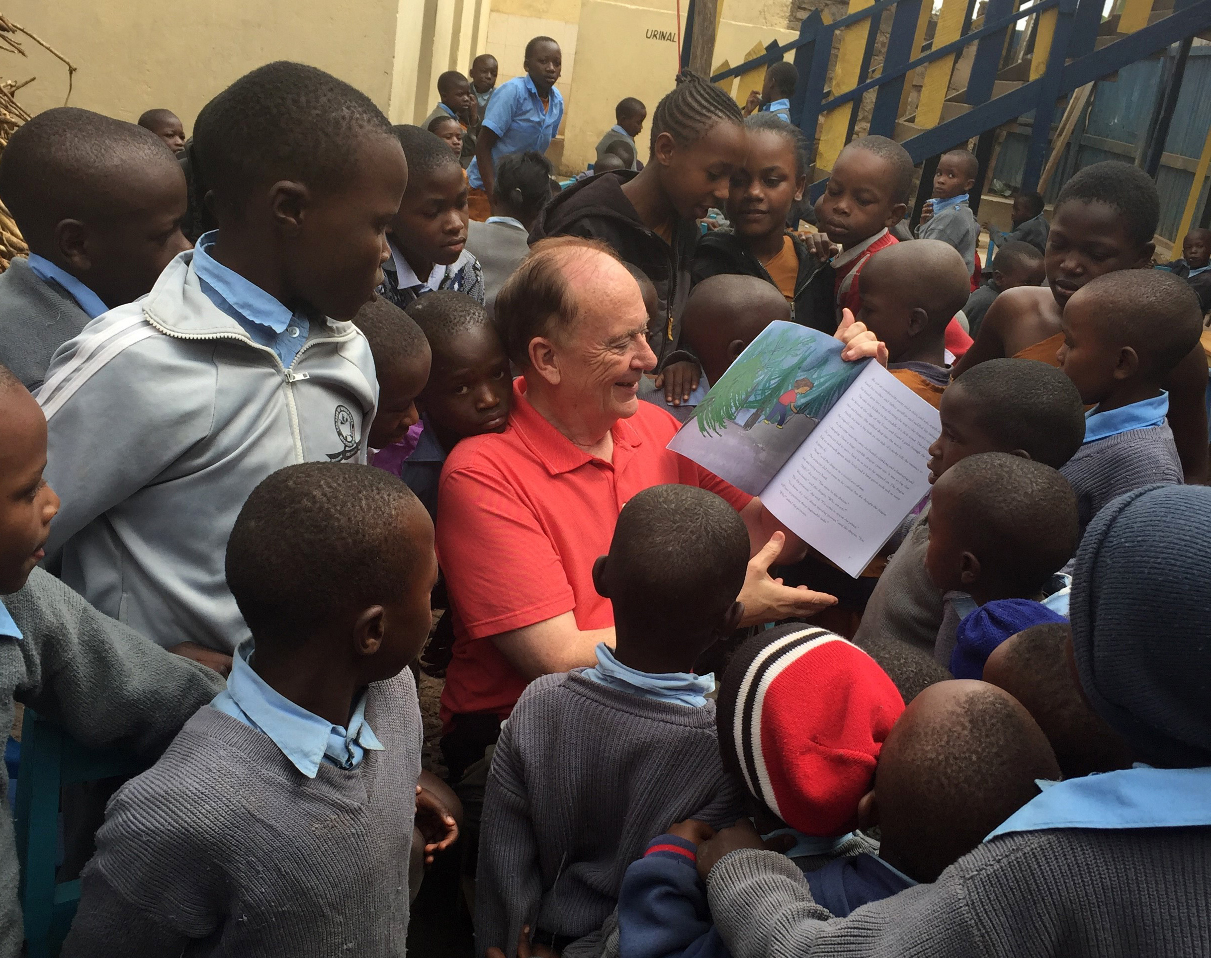 The Rev. Donald E. Messer reads a children’s book to students at the Children of Africa Hope Mission School in the Riruta slums of Nairobi, Kenya. The school is free to orphans and children living with HIV. Messer's organization, The Center for the Church and Global AIDS, is the school's primary sponsor. Photo by Tiffany Nagel