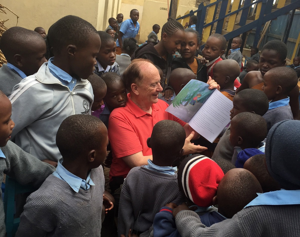 The Rev. Donald E. Messer reads a children’s book to students at the Children of Africa Hope Mission School in the Riruta slums of Nairobi, Kenya. The school is free to orphans and children living with HIV. Messer's organization, The Center for the Church and Global AIDS, is the school's primary sponsor. Photo by Tiffany Nagel