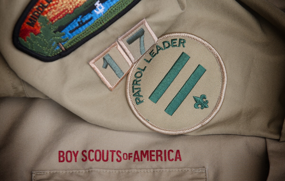 The executive board of Boy Scouts of America has ended its ban on gay leaders. But religiously affiliated units still can maintain their own prohibitions. Photo illustration by Mike DuBose, UMNS