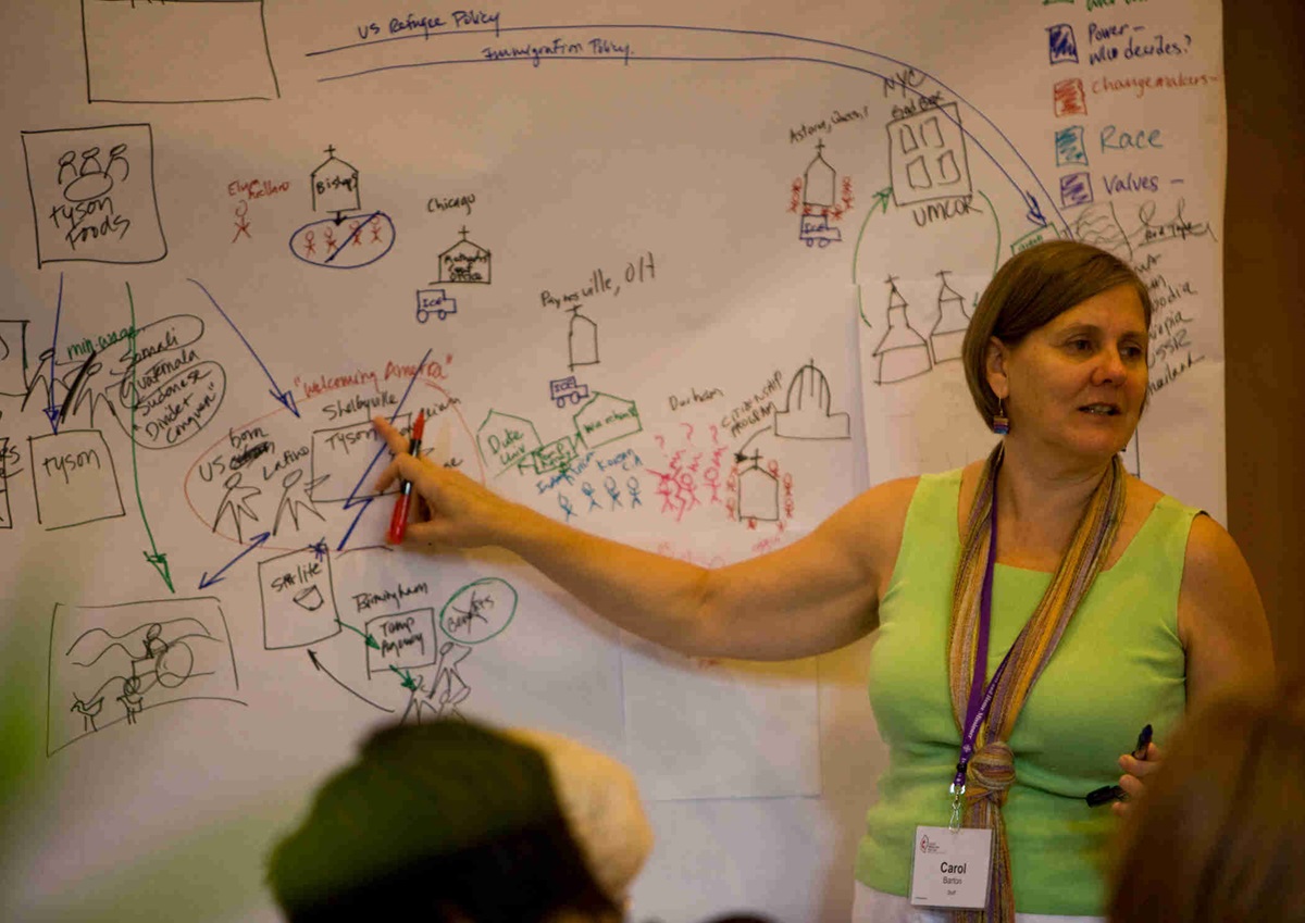 Carol Barton, a staff executive for United Methodist Women, leads a discussion during the 2011 National Seminar in Birmingham, Ala. 