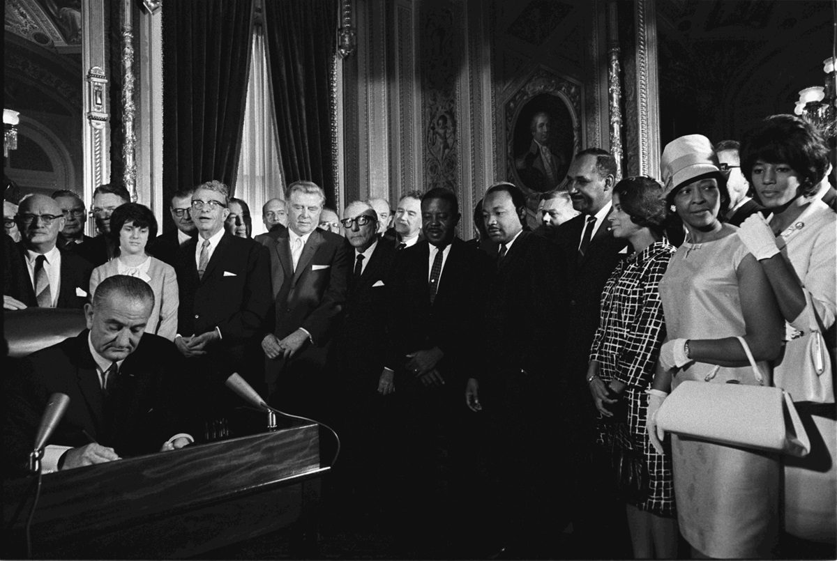 President Lyndon B. Johnson signs the Voting Rights Act of 1965. Photo by Yoichi Okamoto, LBJ Library/Wikimedia Commons