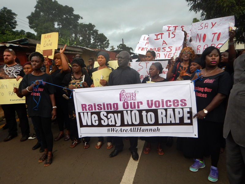 Several groups carry anti-rape messages at the demonstration. Photo by Phileas Jusu, UMNS