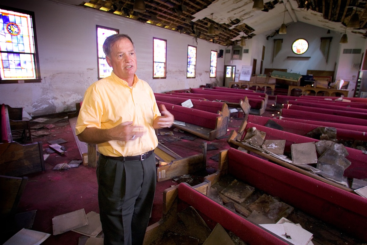The Rev. Irvin Boudreaux discusses recovery efforts at Brooks United Methodist Church in New Orleans in 2006 nearly a year after Hurricane Katrina. File photo by Mike DuBose, UMNS.