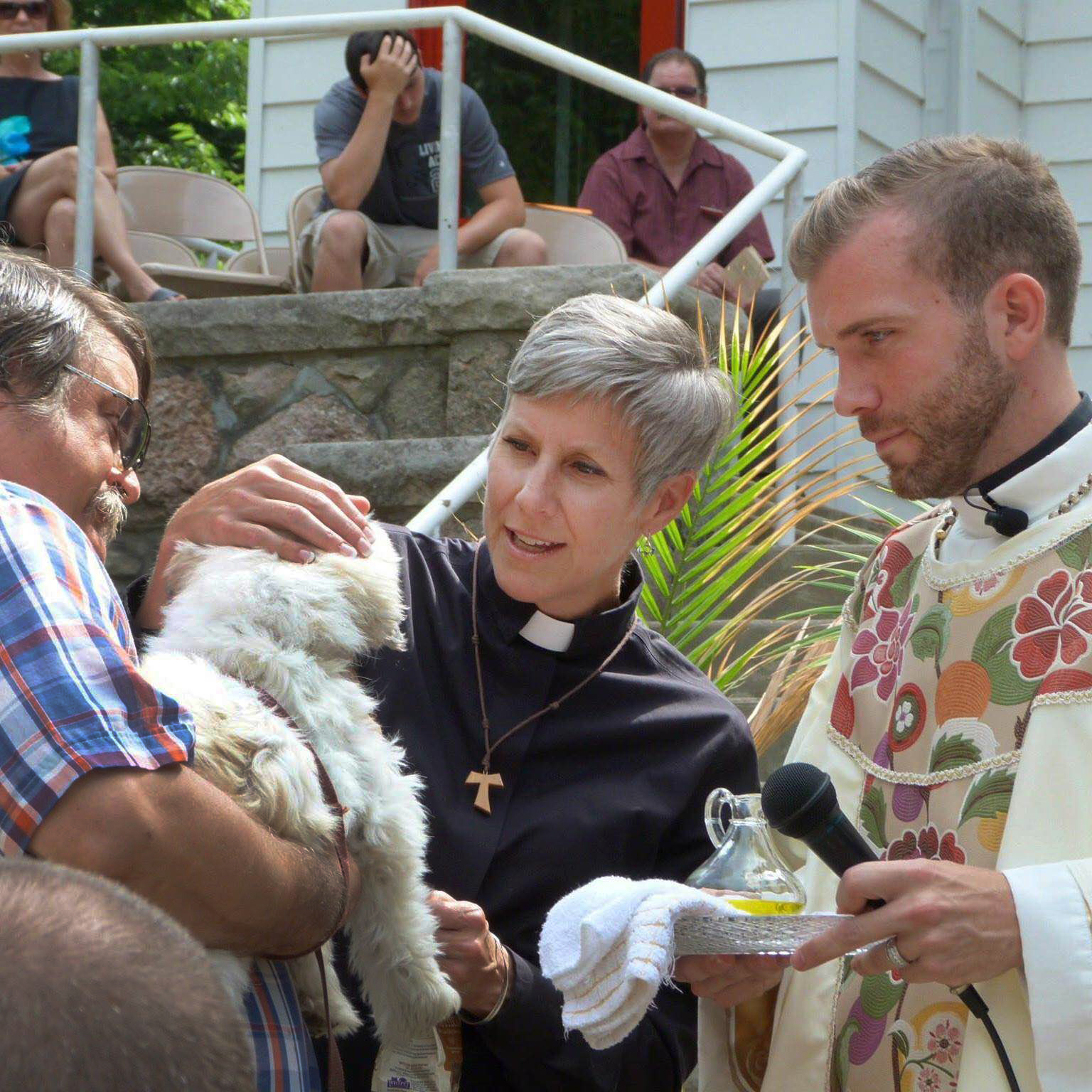 Ginny Mikita helps at a blessing of the animals with the Rev. Benjamin Hutchison at Cassopolis (Mich.) United Methodist Church. Mikita remains a certified candidate to become a deacon after officiating at Hutchison's wedding using online credentials. Photo courtesy of Mikita