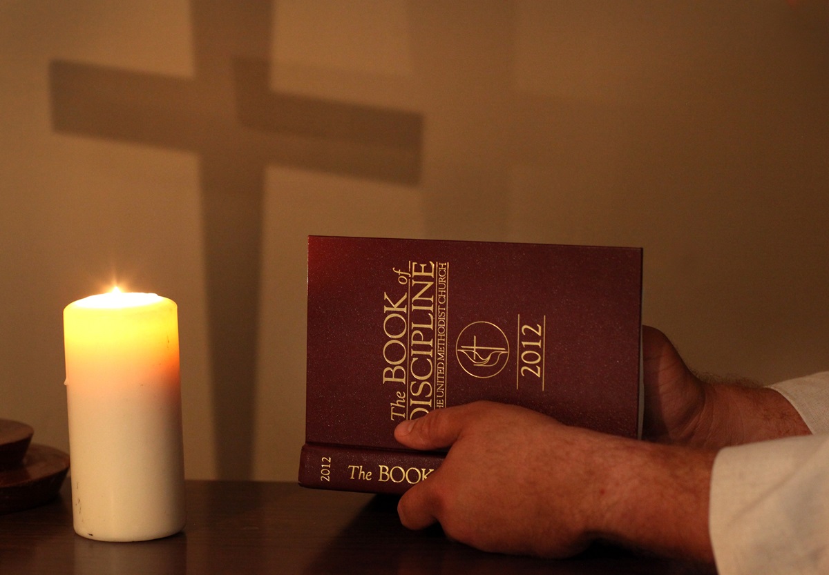 The Rev. Michael Tupper, who faces a complaint for helping to officiate at a same-sex wedding, has agreed to plead guilty and accept the penalty in the case. He said he wants to shed light on what he sees as unjust church law. Photo illustration by Kathleen Barry, United Methodist Communications