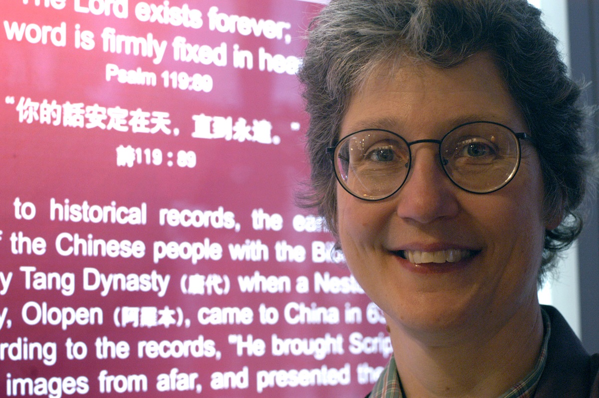 Diane Allen, coordinator of the China Program for the United Methodist Board of Global Ministries, visits the Chinese Bible ministry exhibition at the Cathedral of Saint John the Divine in New York City. The “A Lamp to My Feet, A Light to My Path” Bible ministry exhibition from China is intended as both an educational tool and vehicle for friendship. A UMNS photo by John Goodwin.