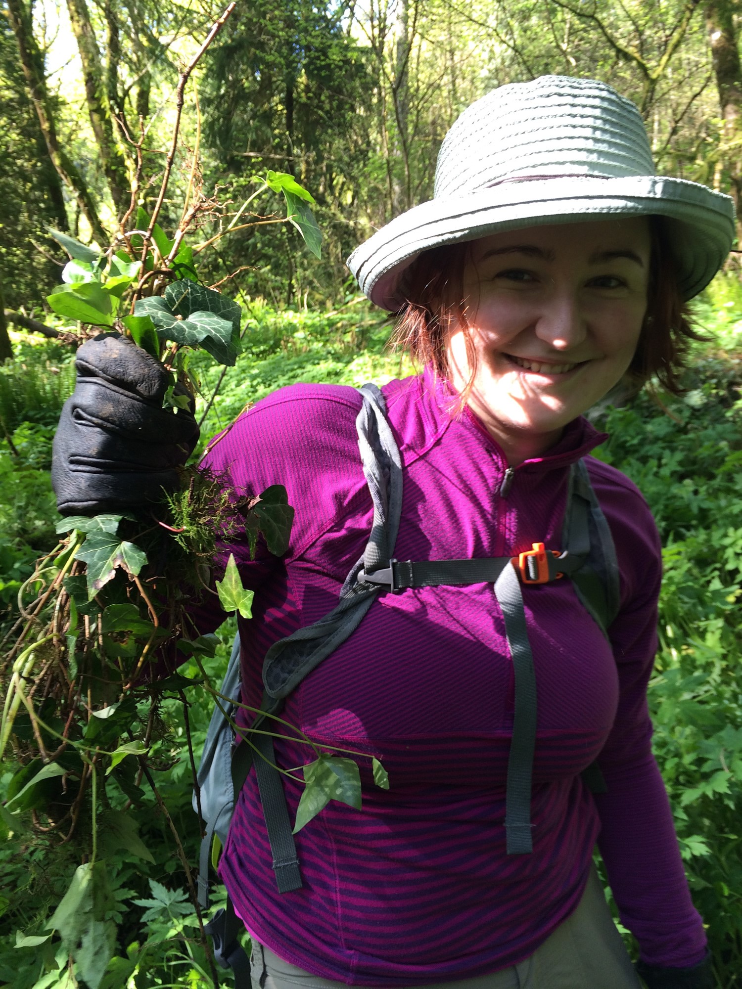 Emily Wright of Portland’s First United Methodist Church gets her hands dirty in an “ivy pull” at Tryon Creek Park in Portland, Ore. The activity was part of the creation-care ministry Planet Church. Photo by Megan Jones, courtesy of First United Methodist Church