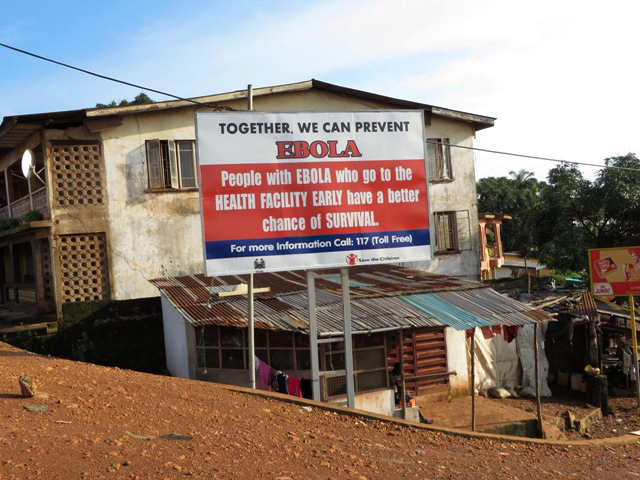Ebola information billboards are displayed by government health partners in Sierra Leone during a three-day lockdown in 2014. A 2014 file photo by Phileas Jusu, UMNS