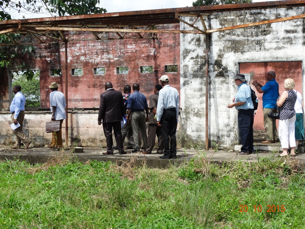 Visitors tour a building that could be renovated to serve as a classroom for the academy. Photo by Phileas Julu, UMNS