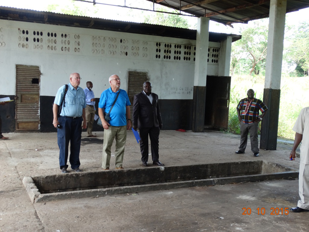 A consulting team tours the Taiama Secondary School campus to look at some of the unused property which could be renovated for the proposed academy. Photo by Phileas Julu, UMNS

