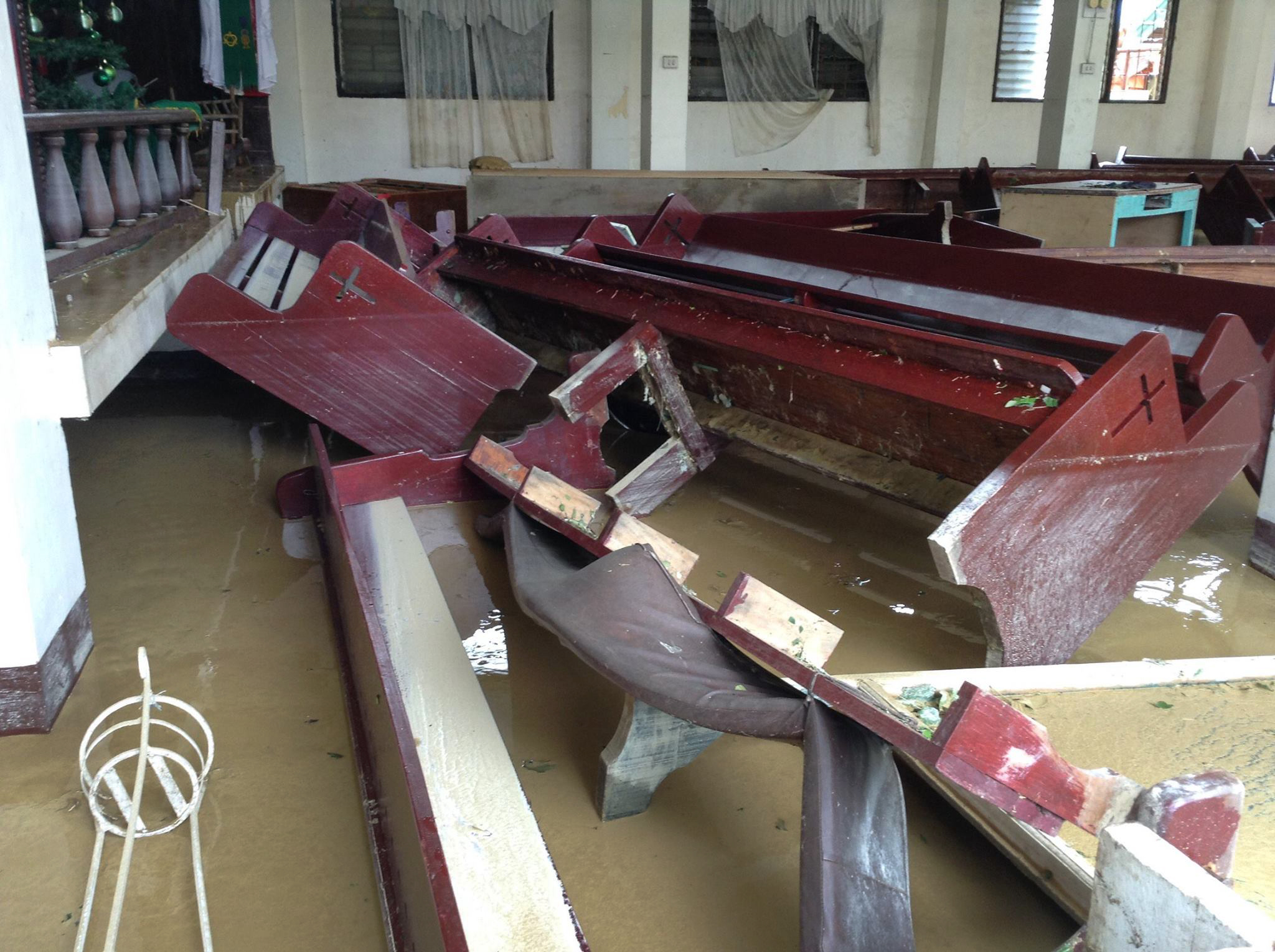  Pews were turned upside down inside the Lusok United Methodist Church during Typhoon Lando. Several United Methodist churches were flooded or damaged.Photo courtesy of Marlon Guilang