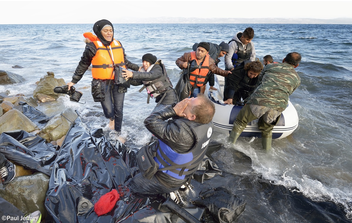 Refugees landed on a beach near Molyvos by local and international volunteers, then proceeded on their way toward western Europe. The refugees paid Turkish traffickers huge sums for the boat ride to Greece. Photo by Paul Jeffrey