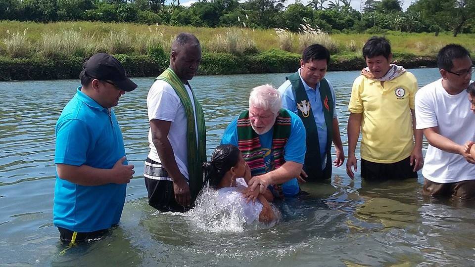 The Rev. Joey Galinato of Good Samaritan United Methodist Church, the Rev. Michael McQueen of St. James United Methodist Church and the Rev. Ronny Branen of Prospect United Methodist Church join in baptizing 47 people. Photo courtesy of the Rev. Joey Galinato