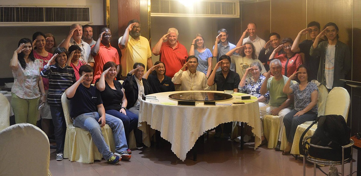 The Bridges Philippines Team, with other Filipino coordinators led by the Philippine Bridges Coordinator Dr. Glen Roy Paraso (seated second from right) and the area bishop (Seated center) Bishop Rodolfo Juan. Photo courtesy of Wilfredo Ramos