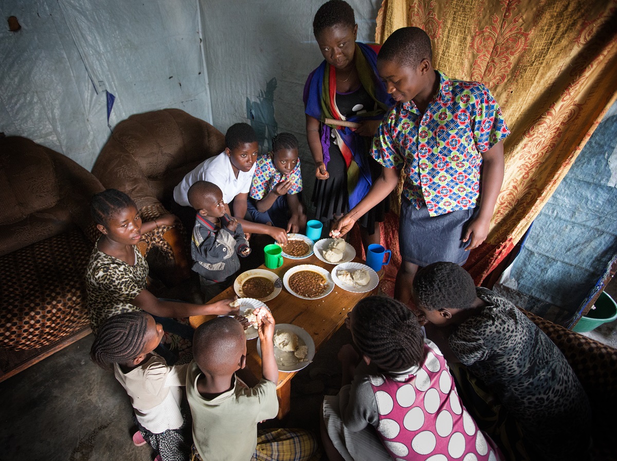 Children share a meal at the United Methodist orphanage in Goma, Democratic Republic of Congo.