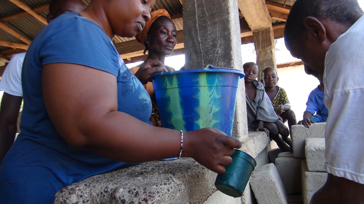 At a community gathering in Tilorma village, Kenema district, Sierra Leone, hand-washing became routine after the outbreak of Ebola. The virus has killed nearly 4,000 people in Sierra Leone. 