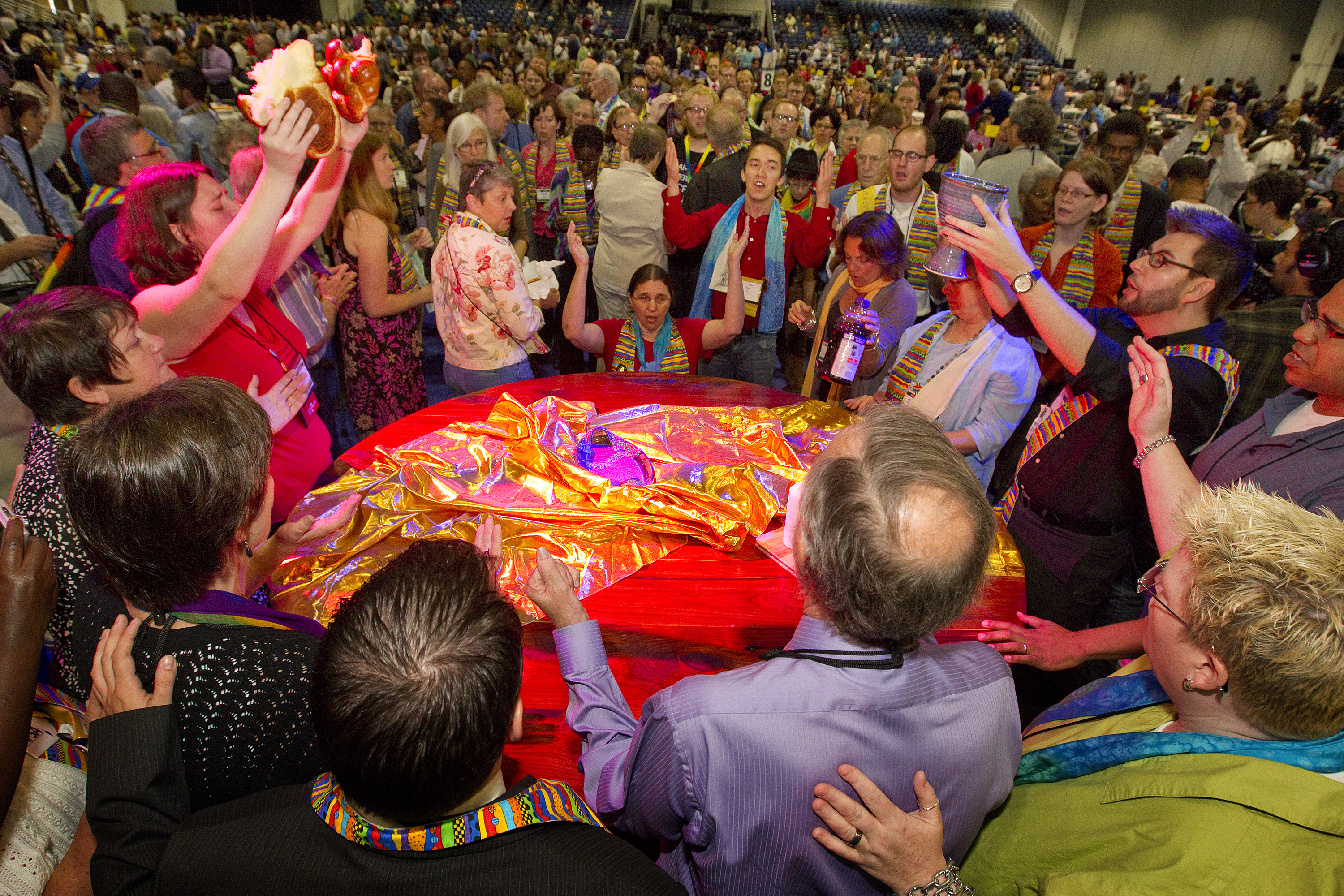 Protesters against the United Methodist Church's stance on sexuality prepare to serve Holy Communion inside the bar of the 2012 United Methodist General Conference in Tampa, Fla. 