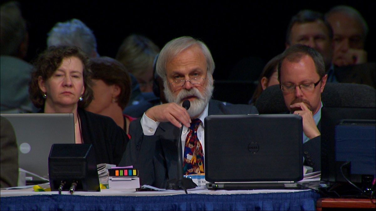The Rev. L. Fitzgerald “Gere” Reist II announces to the 2012 General Conference that the Judicial Council has ruled Plan UMC, agency restructuring legislation, unconstitutional. Screengrab from United Methodist Communications video