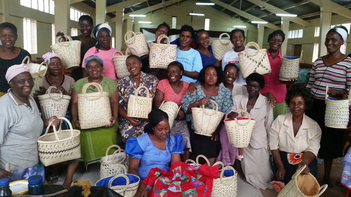 Workshop participants display baskets that they beaded during a workshop held by the Chitungwiza-Marondera District women’s union. Photo by Eveline Chikwanah, UMNS 