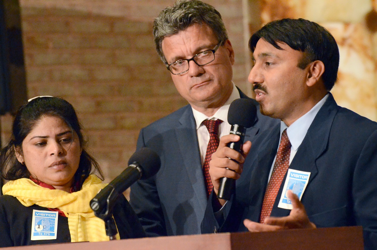 Insar Gohar, right, staff with the Church of Pakistan, and his wife, Uzma Insar, left, share their story with Thomas Kemper, center, top executive of the United Methodist Board of Global Ministries, and the agency’s board of directors during an April 2014 board meeting in New York. Photo by Cassandra Heller, Global Ministries