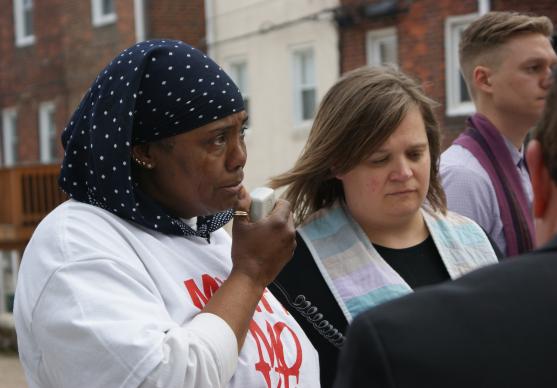 Movita Johnson-Harrell, who lost her son and nephew to gun murder, speaks during the Good Friday Memorial to the Lost walk in Philadelphia, sponsored by Heeding God's Call to End Gun Violence, an ecumenical faith-group which includes United Methodists. Photo by the Rev. Linda Noonan.