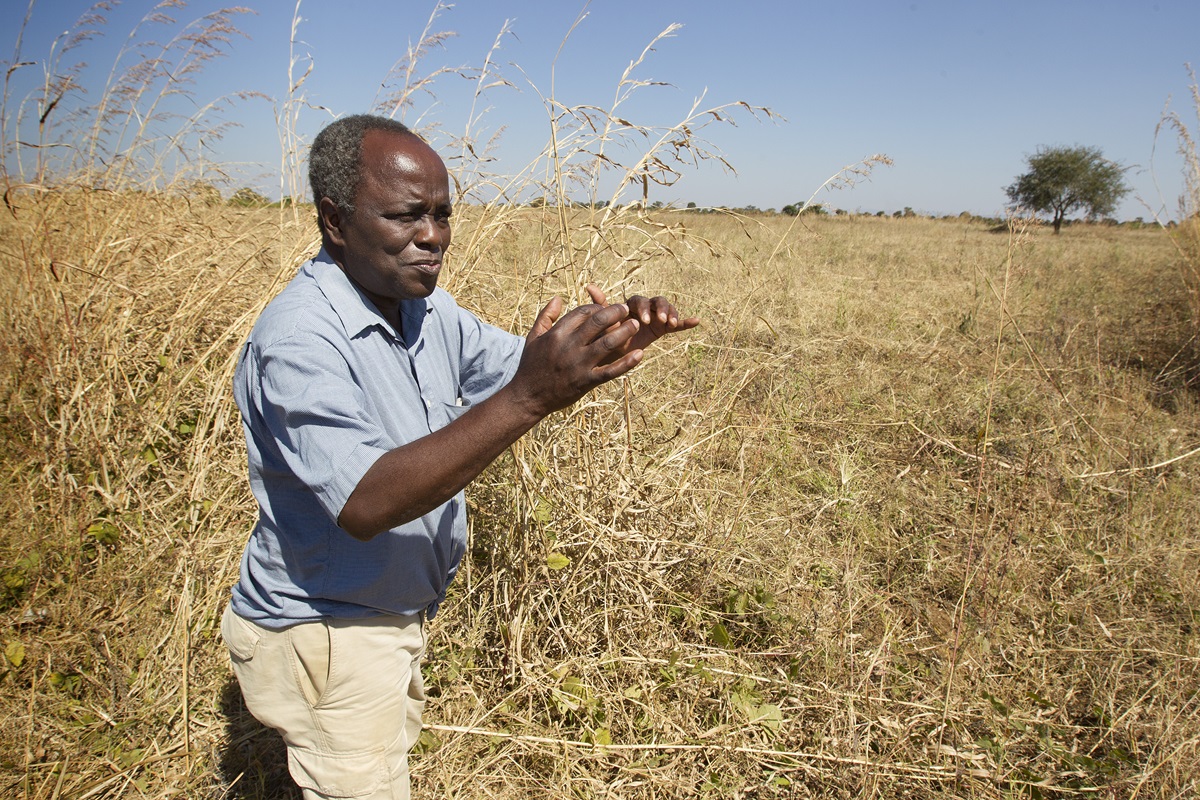 Lester Mhone discusses sustainable agriculture techniques in use at the United Methodist farm in Mchinji, Malawi, in 2013. Although the 2015-16 famine has affected the harvest yield, an irrigation system has helped, said Mhone. File photo by Mike DuBose, UMNS