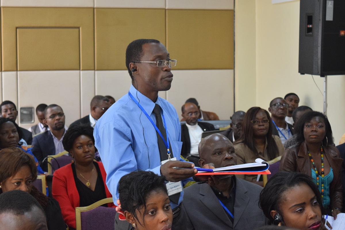The Rev. Ignace Mengada, pastor of Zion United Methodist Church, Obala, Cameroon, speaks at a Peace with Justice seminar. Photo by Neil Christie, United Methodist Board of Church and Society