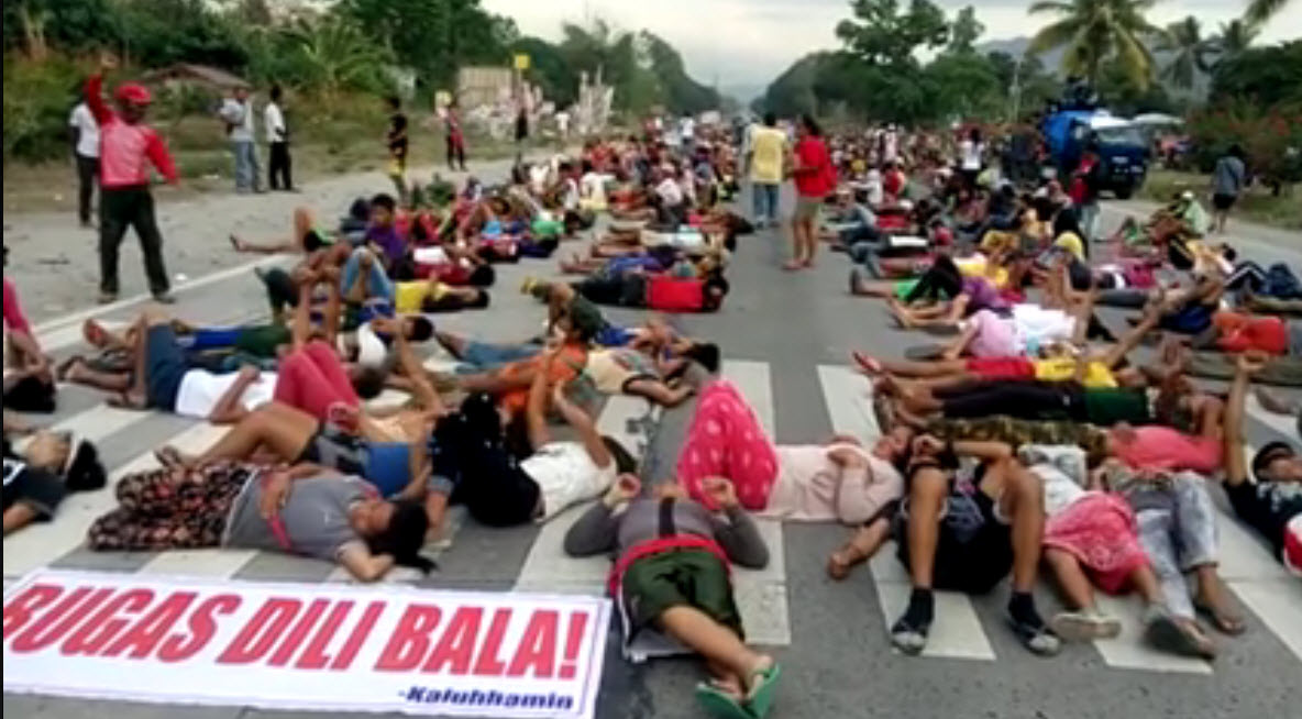 Farmers (many of them Lumads) stage a die-in protest along General Santos-Cotabato national highway in Koronadal City, Philippines, to raise their demand to the government for the immediate release of calamity funds and justice to the farmers of North Cotabato who were violently dispersed last April 1 in Kidapawan City. 