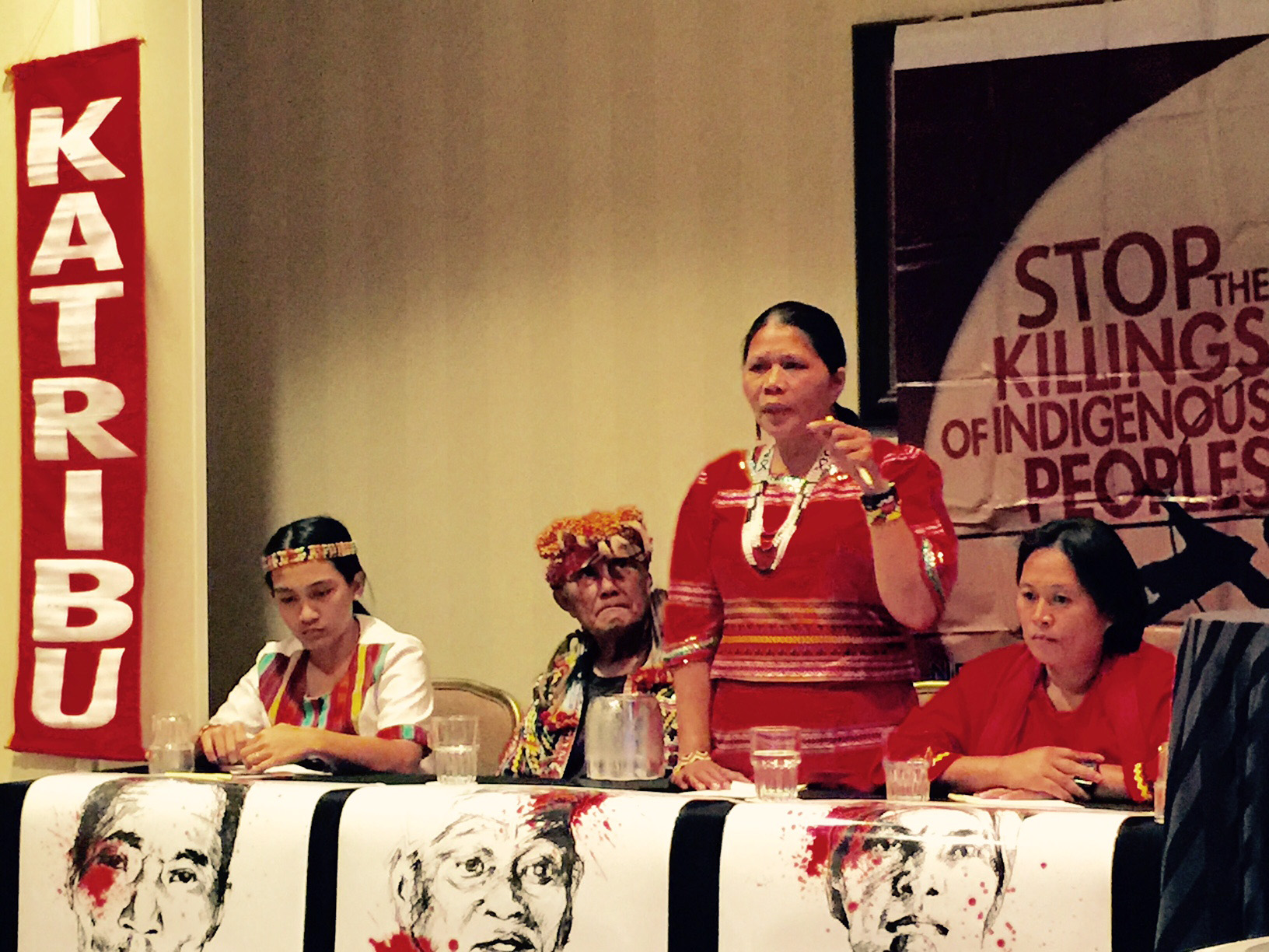 Bai Norma Capuyan addresses the Asia Pacific workshop at the Ecumenical Advocacy Days in Washington, D.C. Capuyan is a Manobo and a leader of Apo Sandawa Lumadnong Panaghiusa of Cotabato. With her are other indigenous peoples in the delegation. 