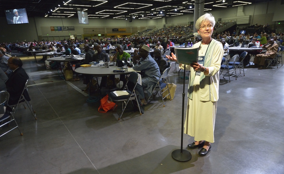 The Rev. Joy Barrett, a clergy delegate from the Detroit Conference, speaks on May 10 to the United Methodist General Conference in Portland, Ore.  Photo by Paul Jeffrey, UMNS.
