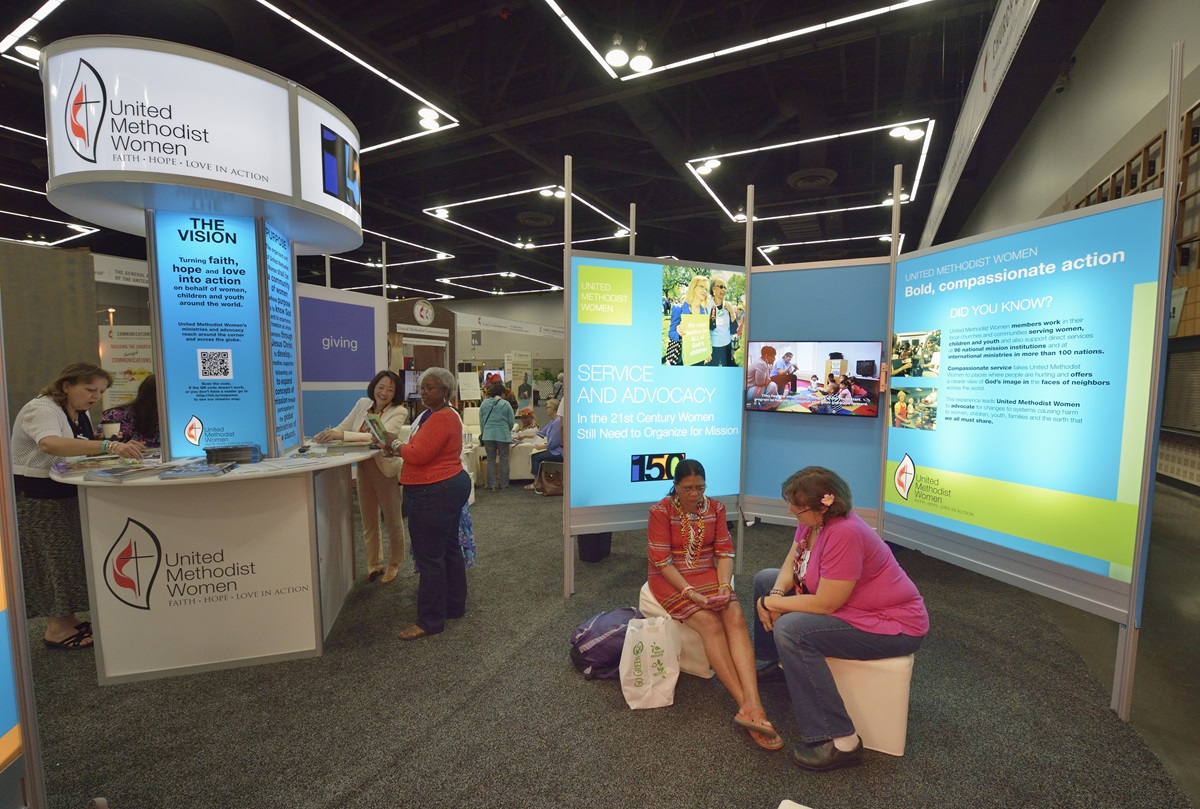 Women visit the display for United Methodist Women in the Exhibit Hall of the 2016 
United Methodist General Conference in Portland, Ore. UMW Day will be observed on May 16. Photo by Paul Jeffrey, UMNS.
