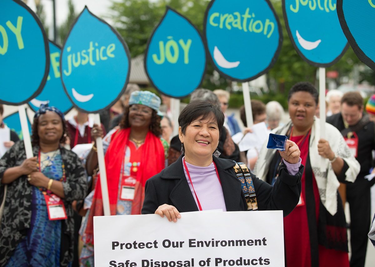 Cristina Manabat of the Philippines (front) joins a United Methodist Women's rally for the right to clean water for all outside the 2016 United Methodist General Conference in Portland, Ore. Photo by Mike DuBose, UMNS.