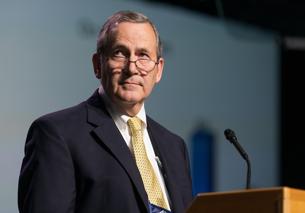 Donald House Sr. watches from the podium May 17 as the vote comes in to refer the proposed creation of a new committee on church growth to the United Methodist Judicial Council for a ruling on its constitutionality. Photo by Mike DuBose, UMNS