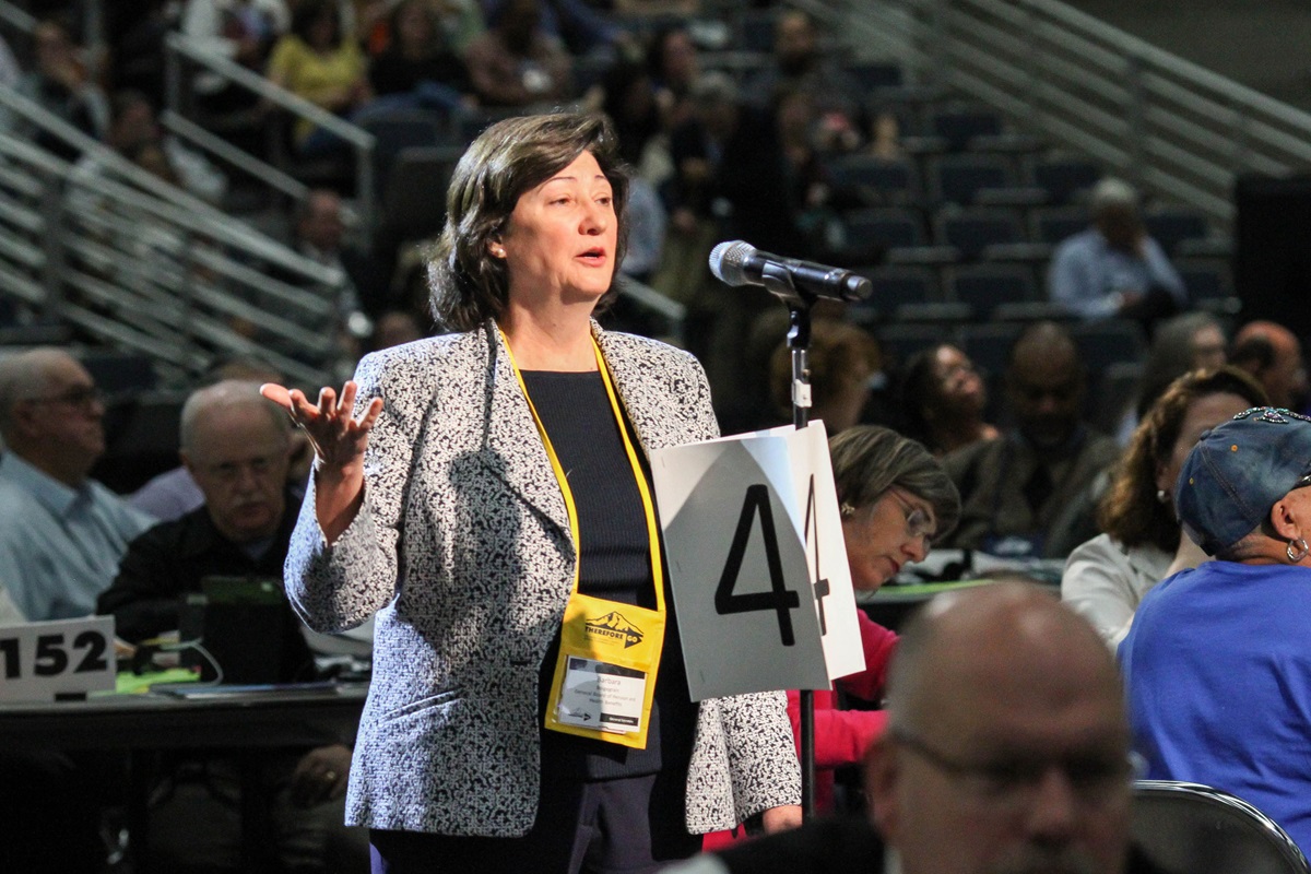 Barbara Boigegrain, top executive of the United Methodist Board of Pensions and Health Benefits, provides information on the board's fossil fuel investments to delegates at the May 20 plenary session of the denomination's 2016 General Conference in Portland, Ore. Photo by Maile Bradfield, UMNS.