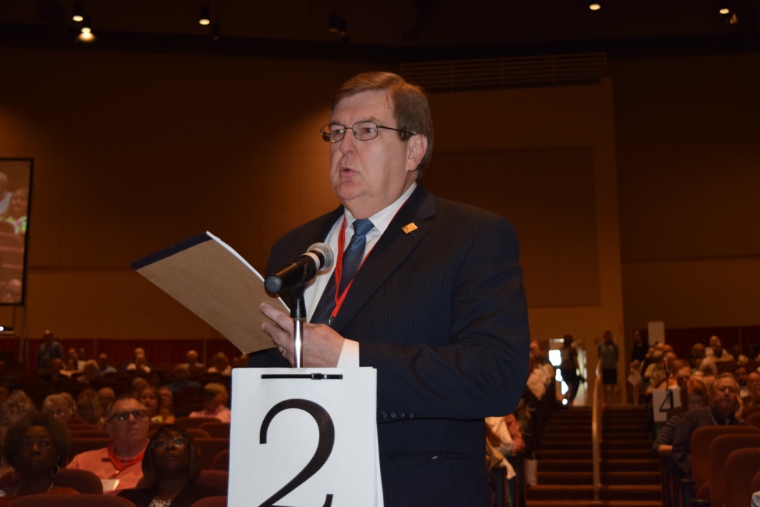 The Rev. Robert Beckum, senior pastor of St. Luke United Methodist Church in Columbus, Ga., makes a motion during the South Georgia Annual Conference’s plenary session asking their resident bishop not receive, for appointment or transfer, clergy who have publicly stated their intent to disregard the current language of the Book of Discipline regarding human sexuality. 