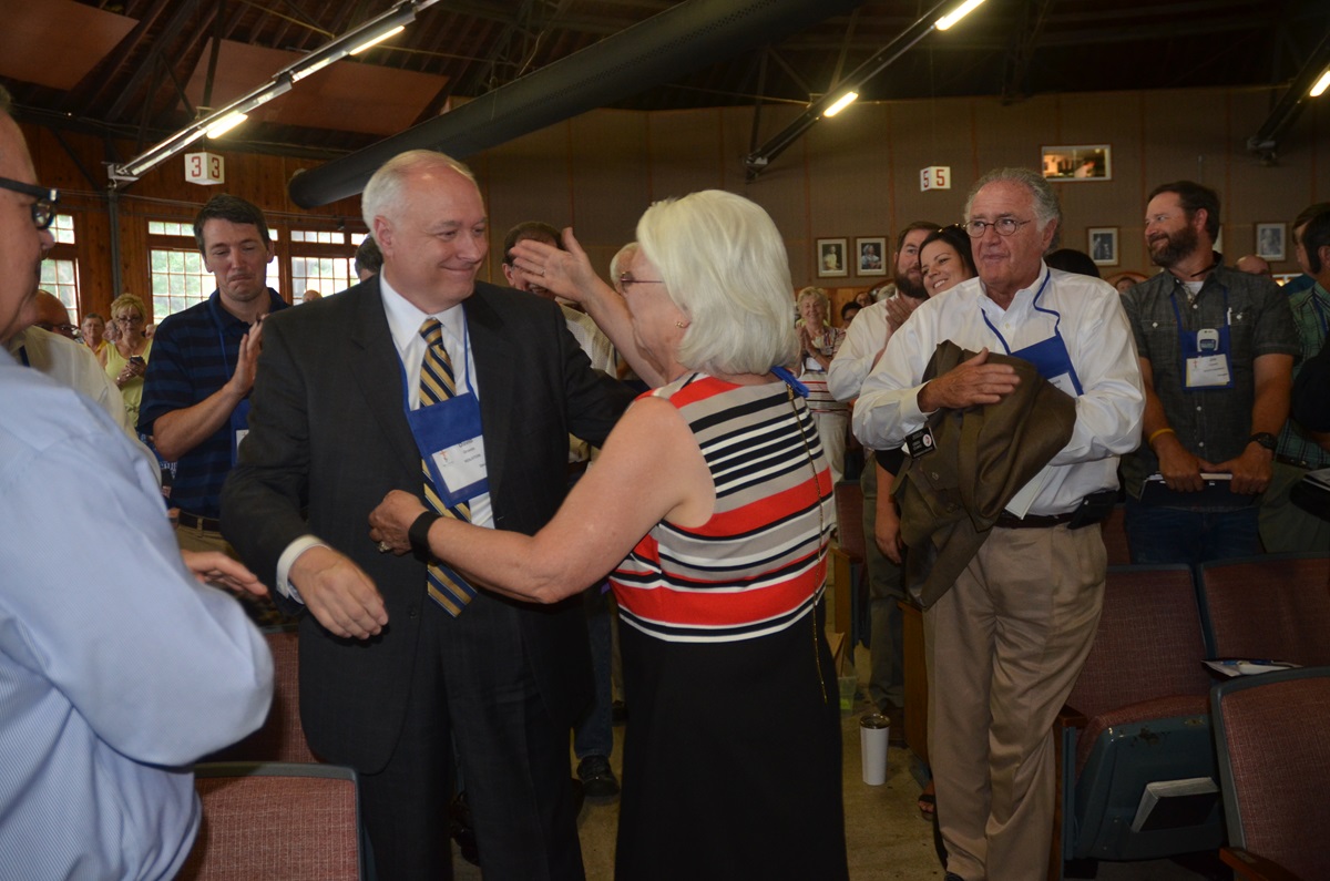 The Rev. David Graves is embraced by Bishop Mary Virginia Taylor, resident bishop of the Holston Conference, following his election as a United Methodist bishop at the Southeastern Jurisdictional Conference on July 13 at Lake Junaluska, N.C. Photo by Annette Spence, Holston Conference 