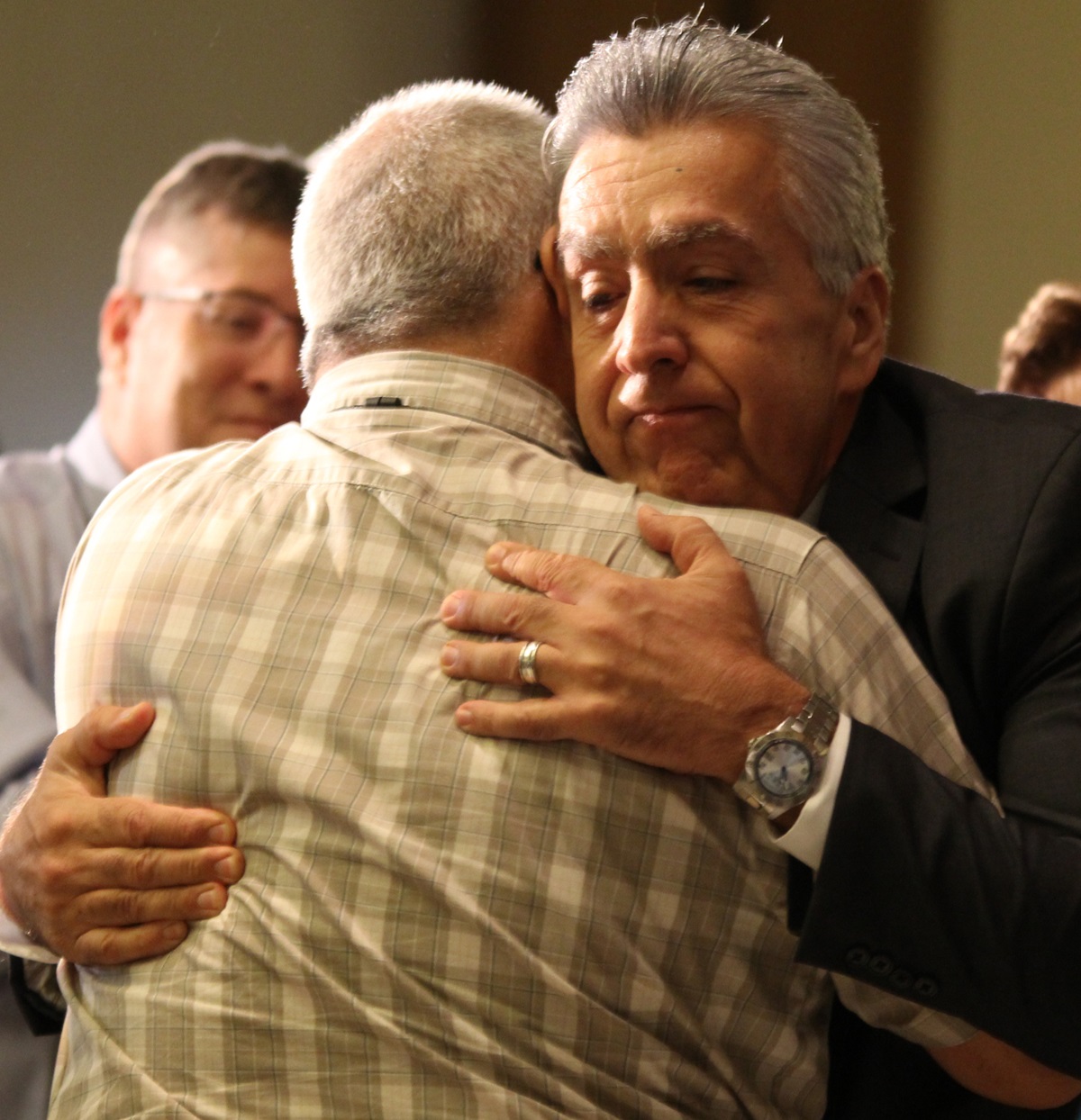 Newly elected Bishop Ruben Saenz Jr. embraces a delegate to the South Central Jurisdictional Conference after winning election during the conference July 14, 2016, in Wichita. Photo by Todd Seifert, Great Plains Conference. 

